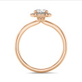 1.00 quilates halo anillo solitario diamante ovalado en oro rojo con diamantes redondos