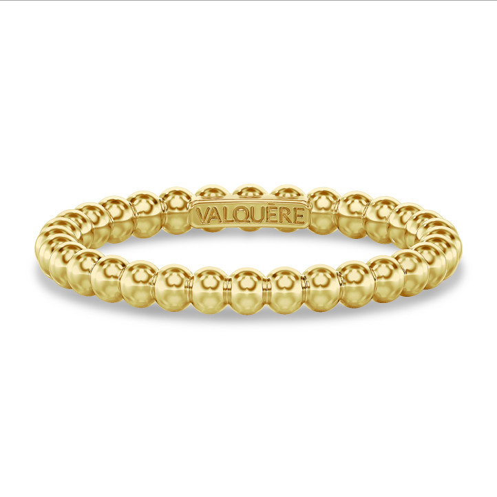 Anillo de combinación con bolitas en oro amarillo