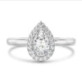 1.50 carats bague solitaire de type auréole avec un diamant poire en or blanc avec diamants ronds
