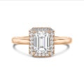 2.00 carats bague solitaire de type auréole avec un diamant émeraude en or rouge avec diamants ronds