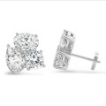 6.00 carats Boucles d'oreilles trilogie en or blanc