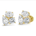 6.00 carats Boucles d'oreilles trilogie en or jaune