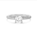 3.00 carats bague solitaire avec un diamant taille asscher et un halo caché en or blanc