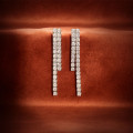 Boucles d'oreilles rivière avec diamants de 3.90 carats en or jaune