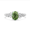 Bague solitaire cluster 1,00 carat en or blanc avec diamant ovale Fancy Vivid Green de synthèse