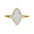 1.00 carats bague solitaire de type auréole avec un diamant marquise en or jaune avec diamants ronds