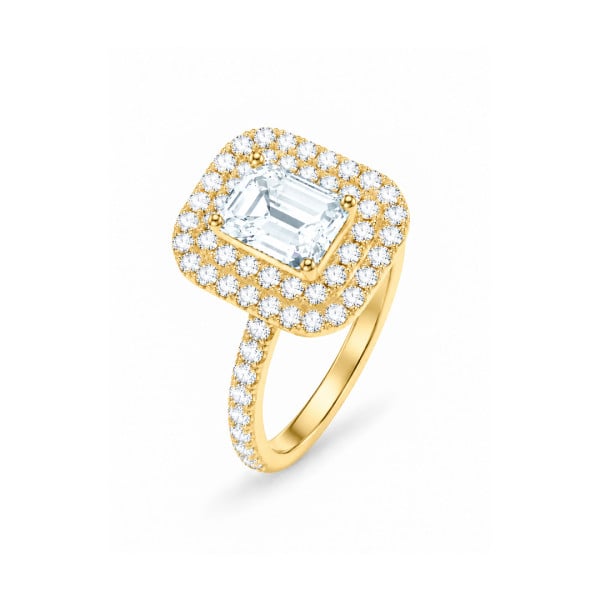 Bague sur mesure sertie d'un diamant taille émeraude et d'un double halo.