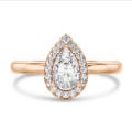 Anello solitario halo da 2,00 carati con diamante pera in oro rosso con diamanti rotondi