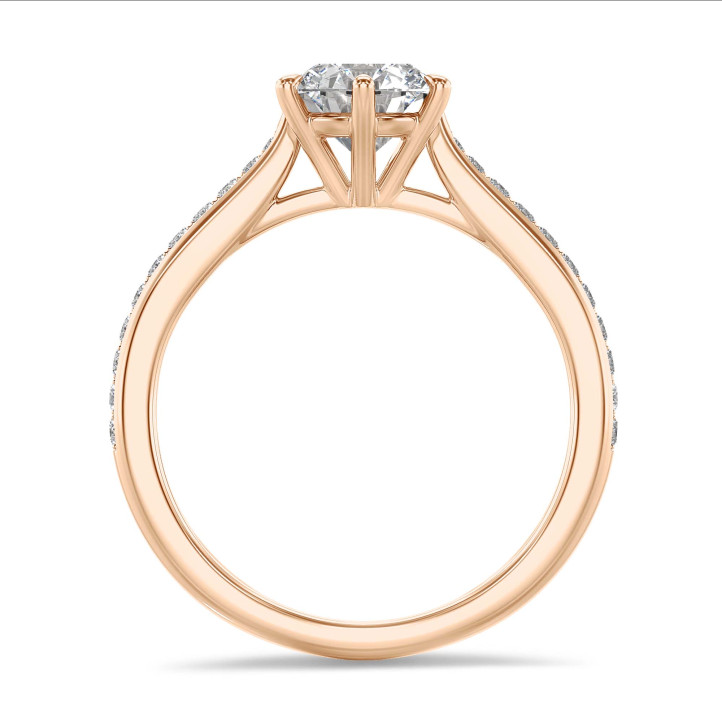 Anello solitario da 1,00 carati in oro rosso con diamante rotondo e diamanti laterali