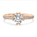 1.50カラットのソリティア・ダイヤモンドリング（ダイヤモンド）をレッドゴールドにセットし、ダイヤモンドを全面に敷き詰めたもの。