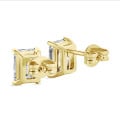3.00カラットのイエローゴールド製ソリティアイヤリングにダイヤモンドのラディアントカットを施したもの
