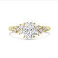 2.00 carat solitaire cluster ring in yellow gold with oval diamond