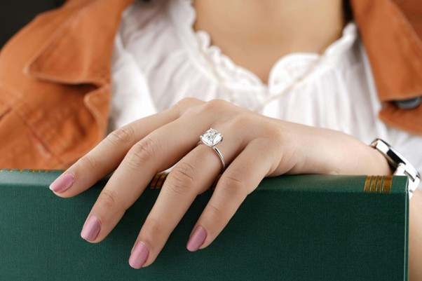 Woman wearing a diamond engagement ring