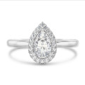 1.00 karaat halo solitaire ring met peervormige diamant in wit goud met ronde diamanten