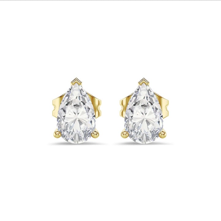 4.00 karaat solitaire oorbellen in geel goud met peervormige diamanten