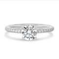 1.20 karaat solitaire ring in wit goud met zijdiamanten