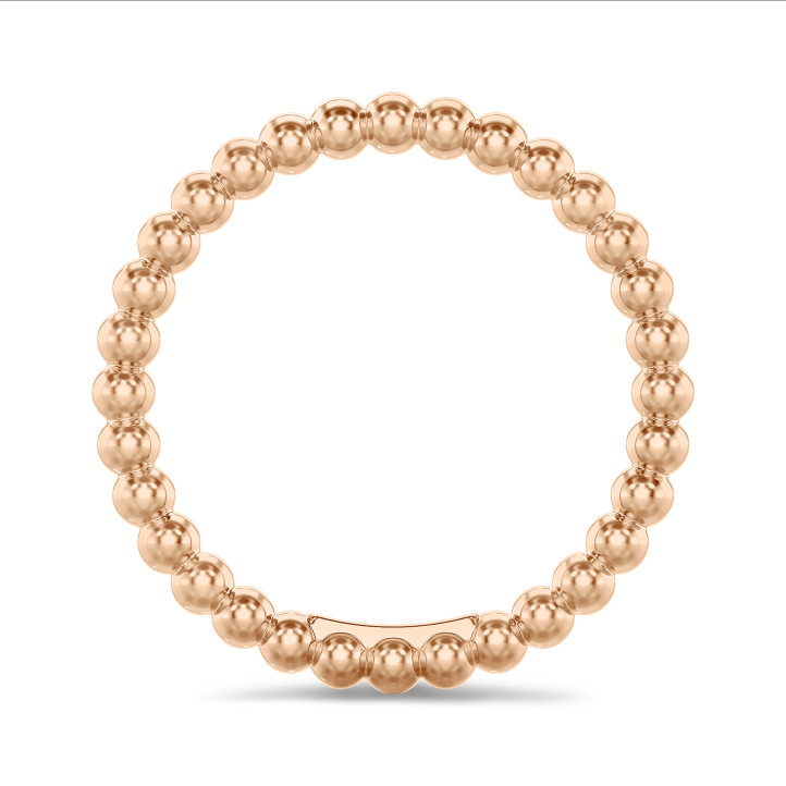 Combinatie ring met bolletjes in rood goud