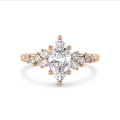 1.00 karaat solitaire clusterring in roodgoud met marquise diamant
