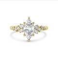 1.00 karaat solitaire clusterring in geelgoud met marquise diamant