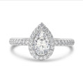 5.00 karaat halo solitaire ring met peervormige lab grown diamant in wit goud met ronde lab grown diamanten