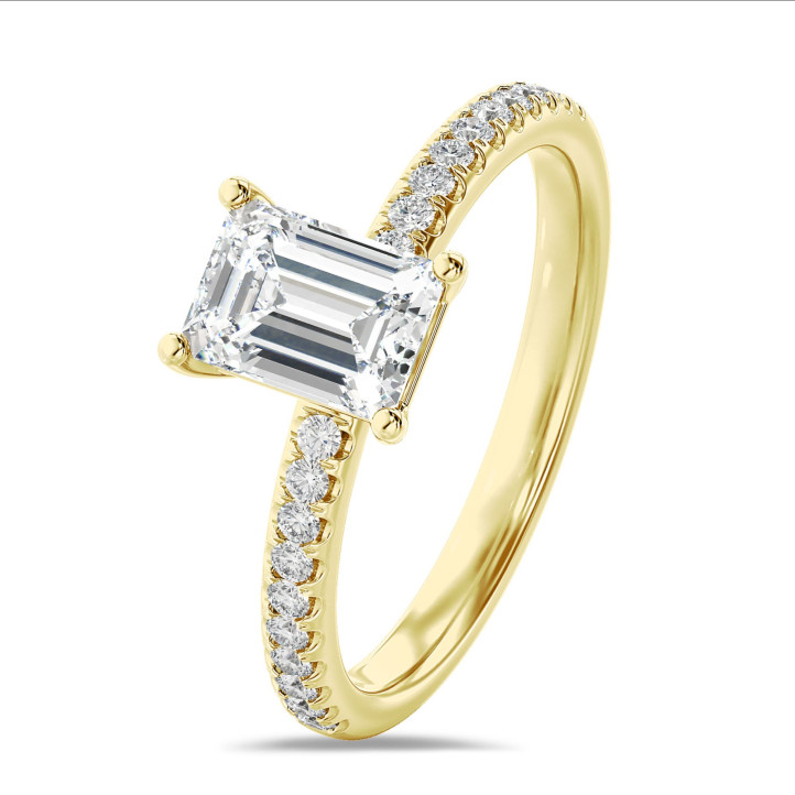5.00 karaat solitaire ring met een lab grown emerald cut diamant in geel goud met lab grown zijdiamanten