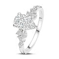 1.00 karaat solitaire clusterring in wit goud met een peervorm diamant