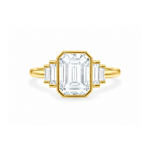 Op maat gemaakte trilogie-ring met een emeraldvormige diamant in bezelzetting en afgesneden zijstenen